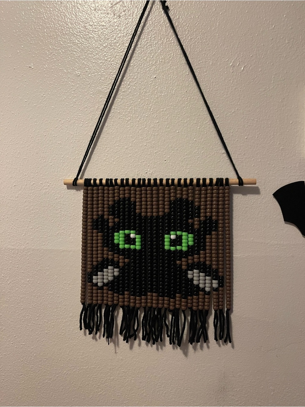 Handmade Black and Brown Beaded dragon Wall Hanging with Green Eyes